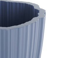 "Rippled blue vase with a textured finish and irregular, wavy rim design."