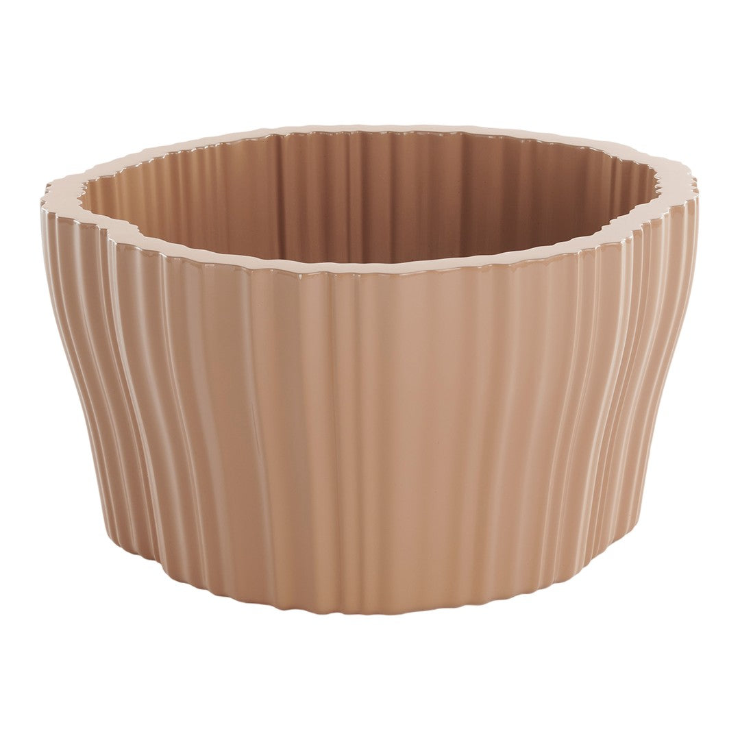 Textured beige planter with wavy pattern, perfect for adding a natural touch to your home decor.