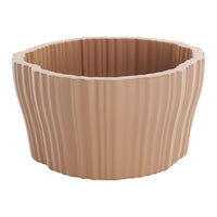 Textured beige planter with wavy pattern, perfect for adding a natural touch to your home decor.