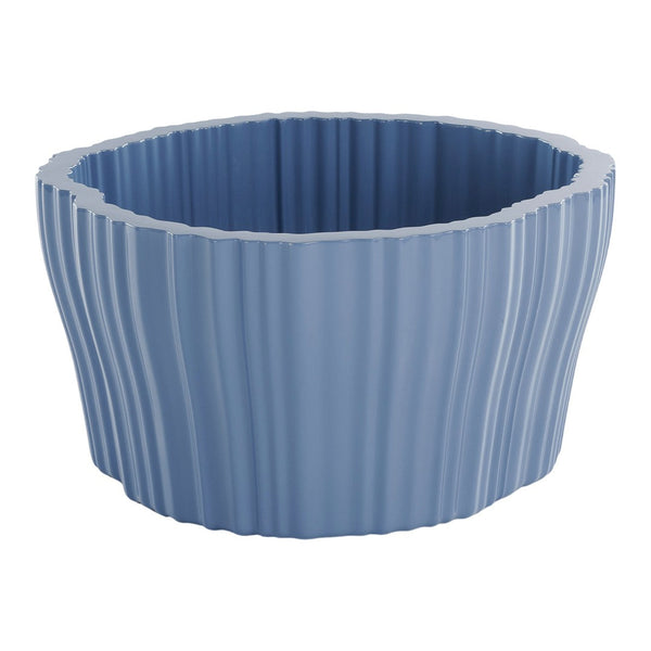 Blue ribbed planter with a textured surface, featuring a soft pastel shade and wavy edges for a modern touch.