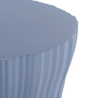 Light blue round table with a scalloped edge and ribbed texture for stylish decor.