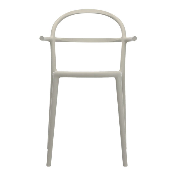 Minimalist white chair with smooth lines and a sleek, modern design. Perfect for contemporary interiors.