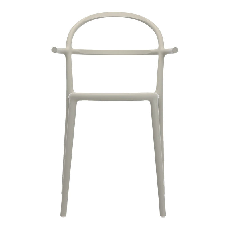 Minimalist white chair with smooth lines and a sleek, modern design. Perfect for contemporary interiors.