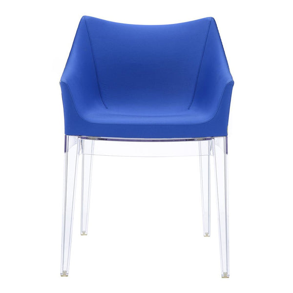 Vibrant blue chair with a sleek design and transparent legs, perfect for modern decor.