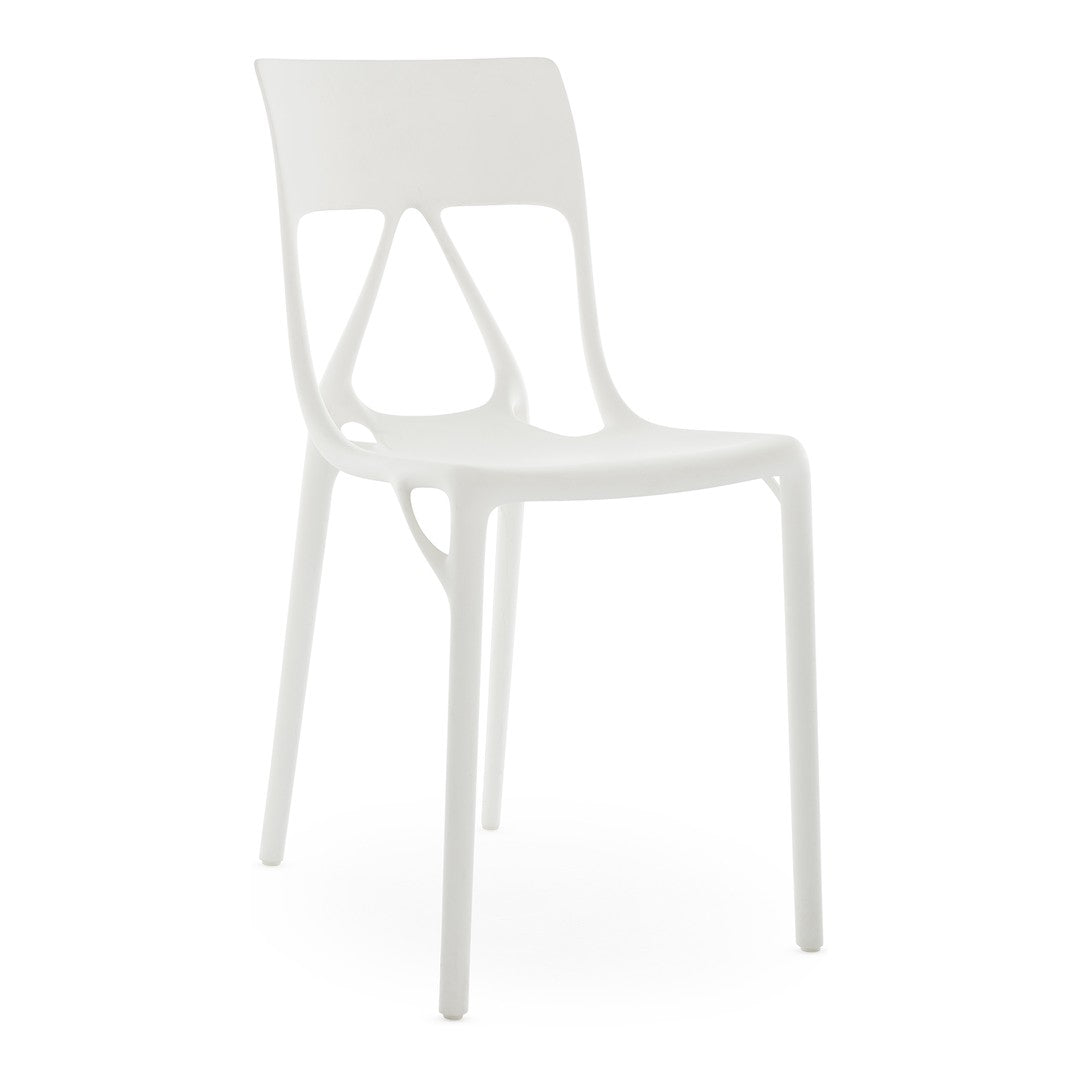 White modern chair with a sleek design, featuring a minimalist pattern and glossy finish. Ideal for contemporary spaces.