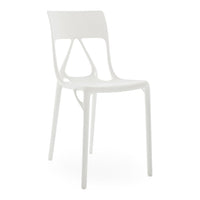 White modern chair with a sleek design, featuring a minimalist pattern and glossy finish. Ideal for contemporary spaces.