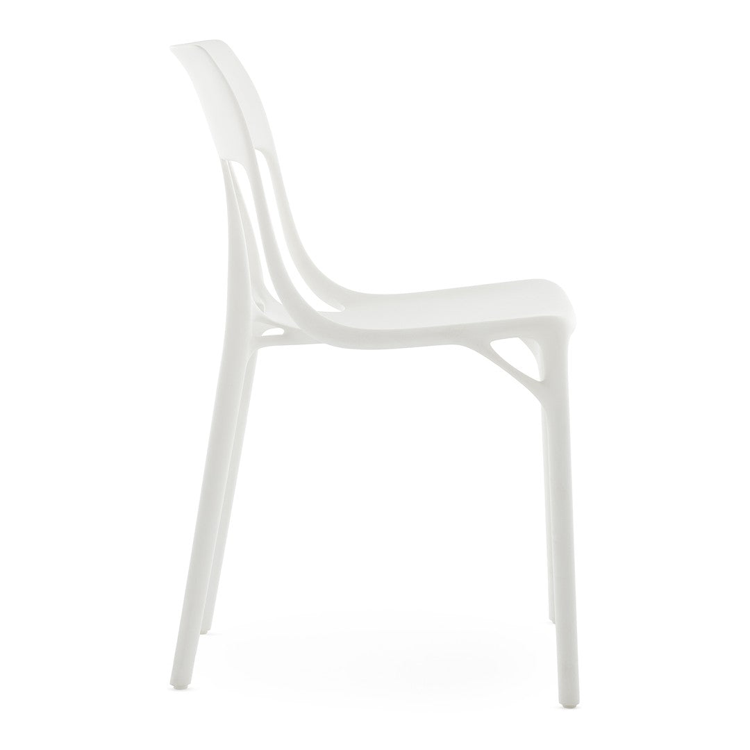 White modern chair with a sleek, minimalist design and smooth, curved lines against a white background.