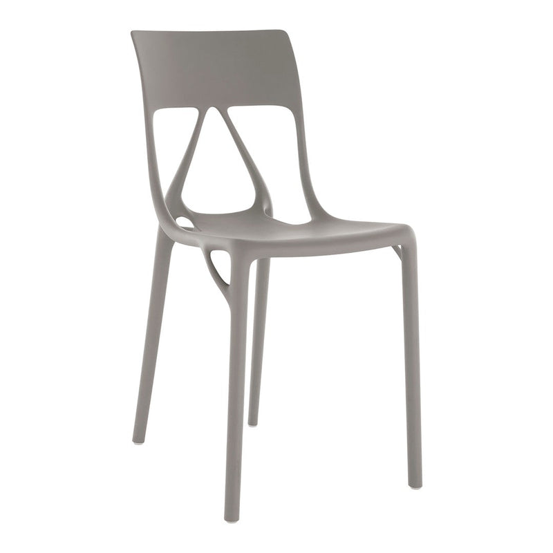 Gray plastic chair with a modern design, featuring smooth lines and a minimalist pattern, perfect for contemporary spaces.