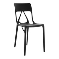 Sleek black chair with a modern cut-out design and smooth matte finish, perfect for contemporary decor.