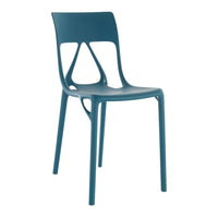 Teal chair with a sleek design and cut-out pattern, perfect for modern decor.