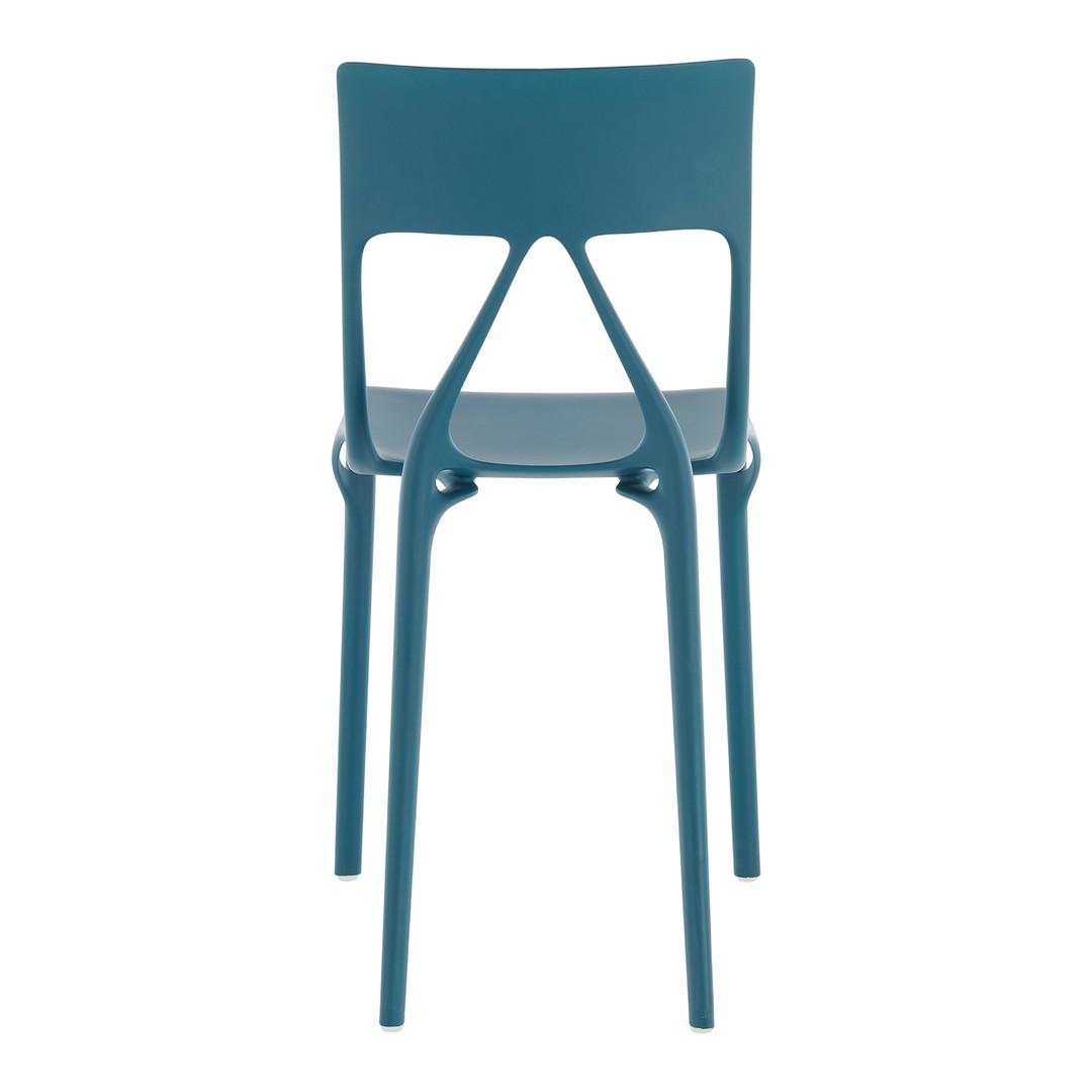 "Modern blue chair with a sleek design and minimalist patterns, perfect for any contemporary space."