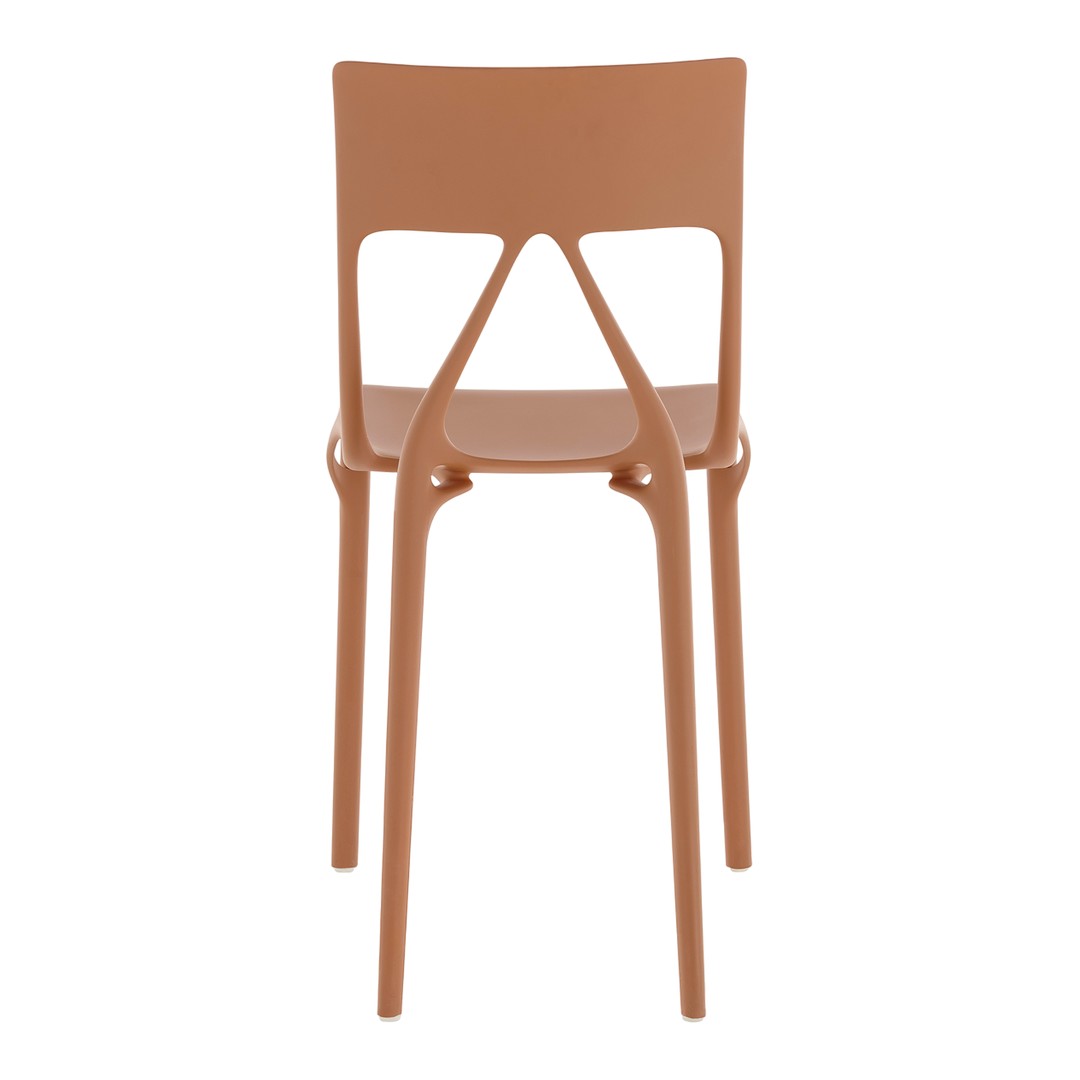 Rustic brown plastic chair with a smooth finish and minimalist design, featuring a sleek, modern silhouette.