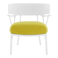 White chair with a vibrant yellow textured cushion, featuring a modern design and clean lines.