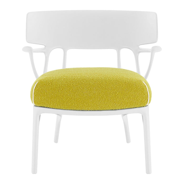 White chair with a vibrant yellow textured cushion, featuring a modern design and clean lines.