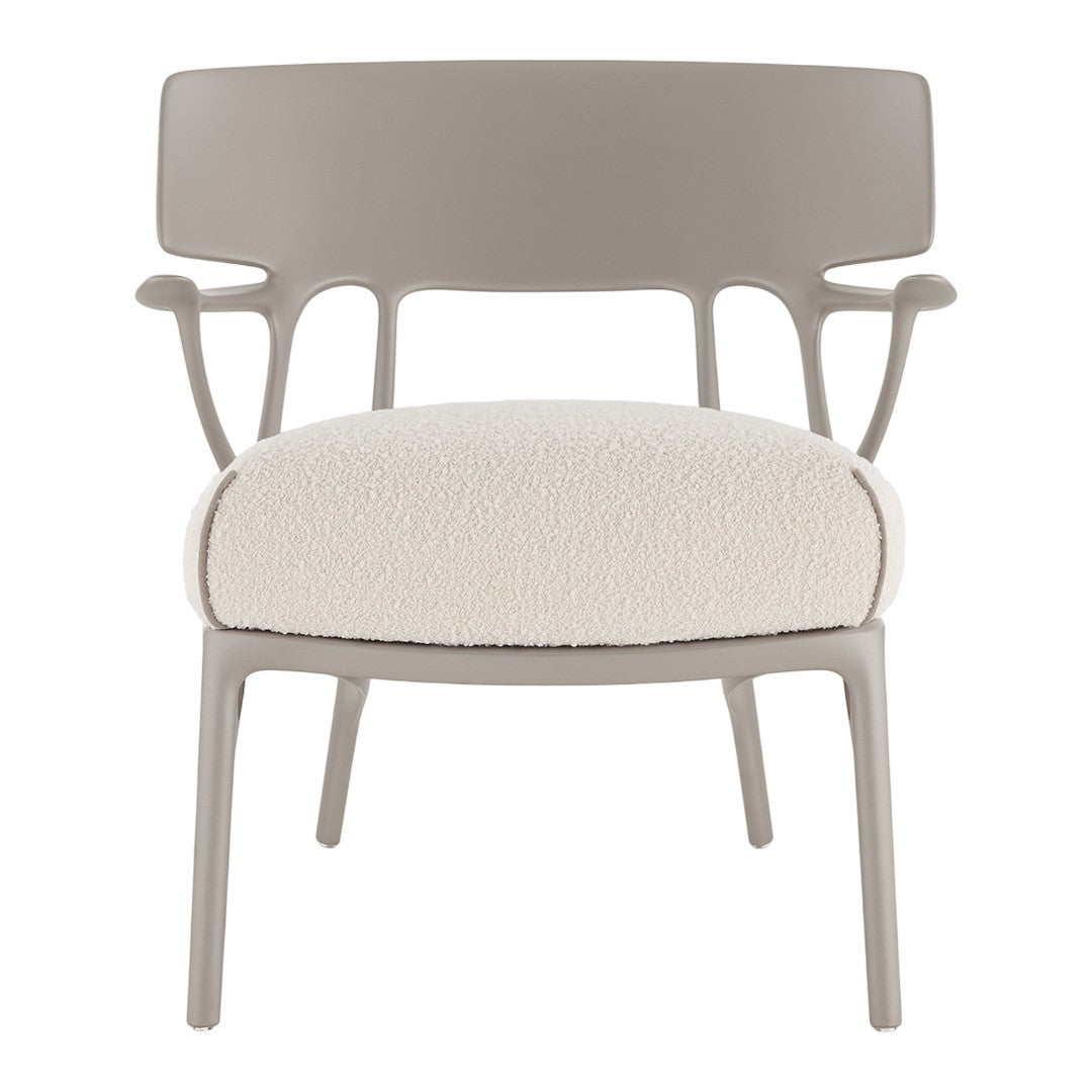 Contemporary chair in soft beige with a plush, cream seat and a smooth, sleek design. Ideal for modern decor.