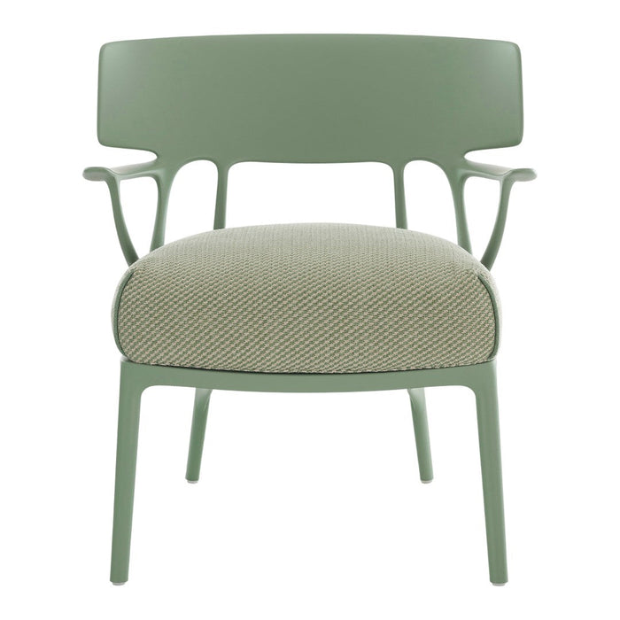 Green chair with textured light green fabric, featuring a modern design and subtle herringbone pattern.