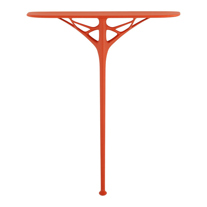 Bright orange table with a sleek, modern design featuring intricate cut-out patterns. Ideal for contemporary decor.