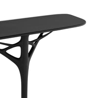 Sleek black console table with an organic pattern base, perfect for modern decor. Minimalist design enhances any space.