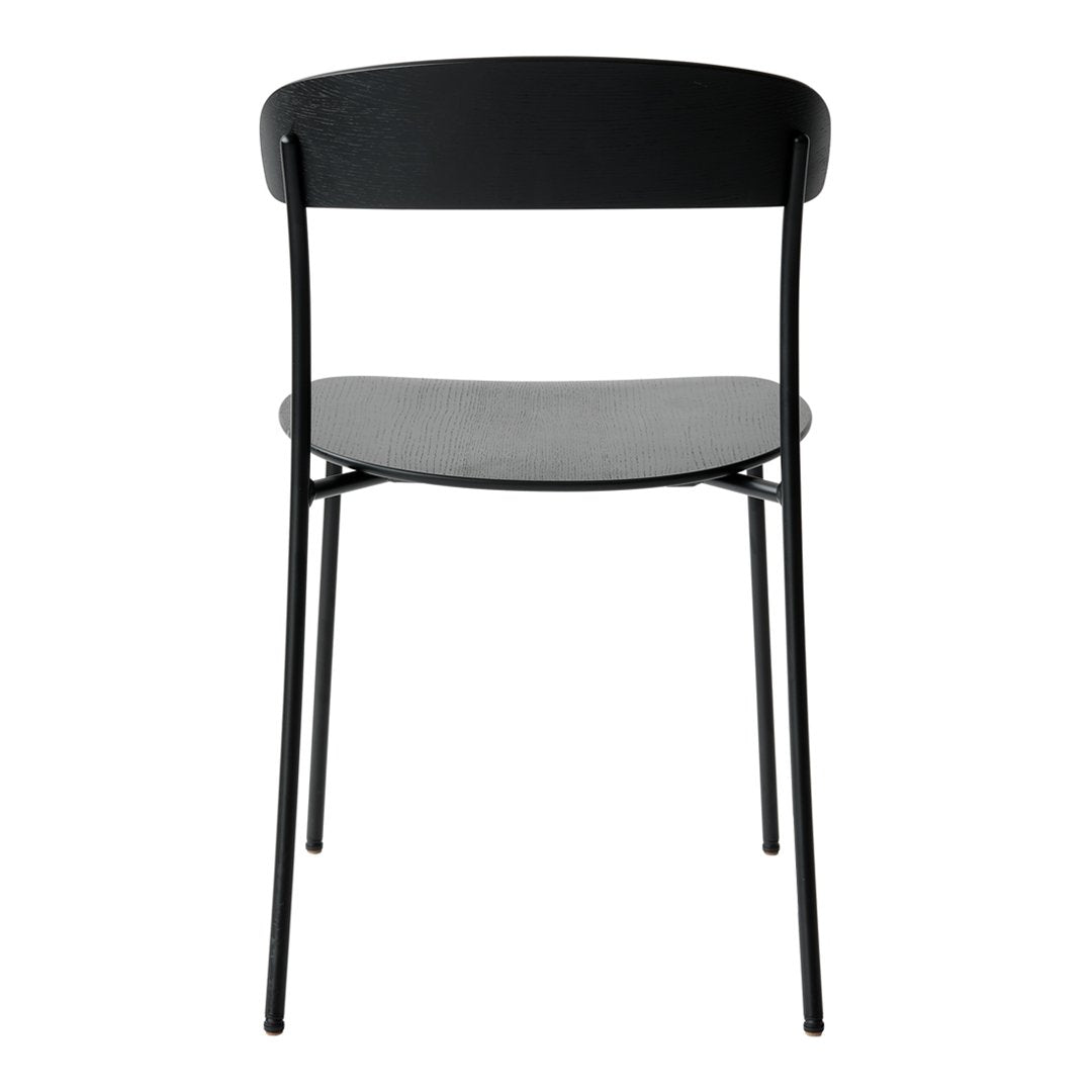 Black chair with a smooth matte finish and a subtle gray seat. Modern design with minimalistic lines.