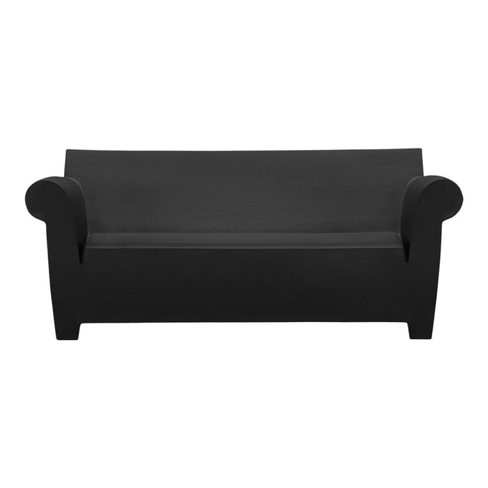 Black minimalist sofa with smooth fabric and rounded armrests, perfect for modern decor.