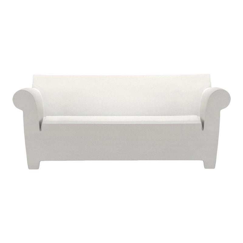 White minimalist sofa with solid color, featuring smooth lines and a simplistic, modern design. Perfect for any decor.