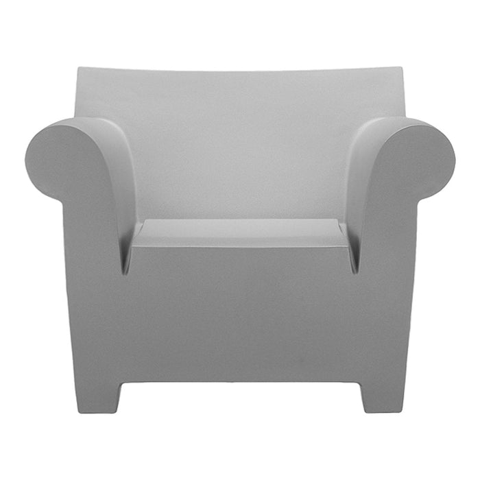 Stylish gray armchair with smooth, minimalist design and rounded arms, perfect for modern decor.
