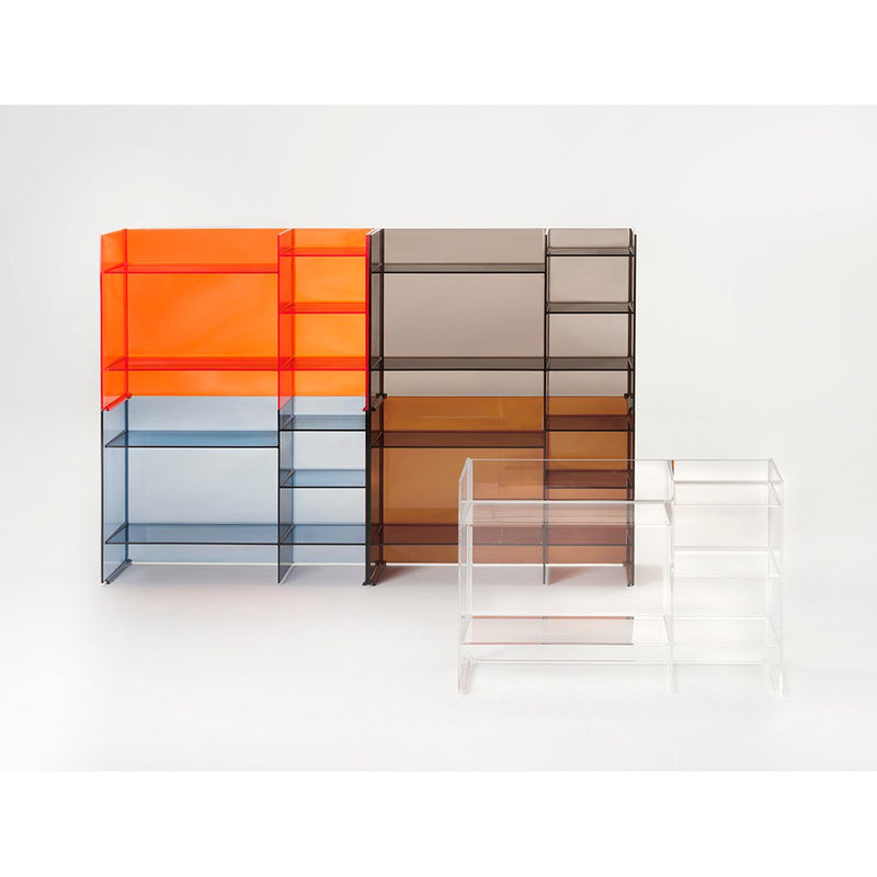 Colorful transparent shelving units in orange, blue, brown, and clear with geometric patterns and modern design.