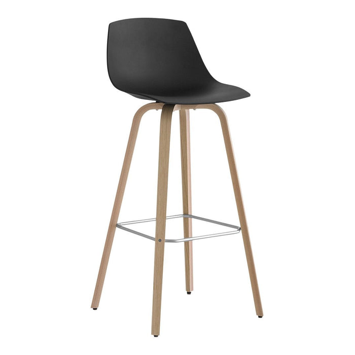 Black plastic bar stool with natural wood legs and a silver footrest, showcasing a modern design and sleek finish.