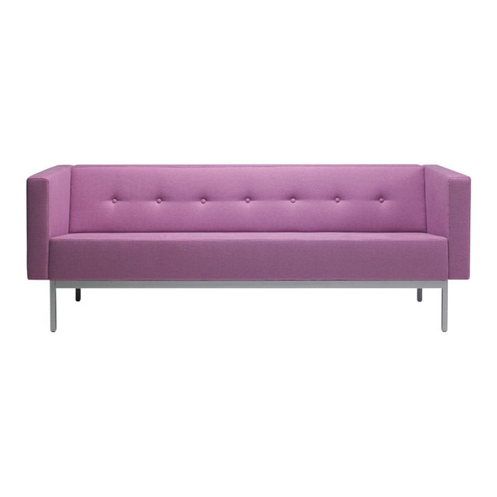 Pink tufted sofa with a modern design and sleek metallic legs, ideal for stylish living spaces.
