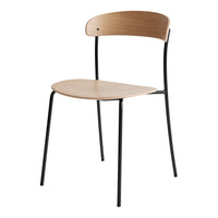 Minimalist black metal chair with a natural wood seat and backrest, showcasing a sleek, modern design.
