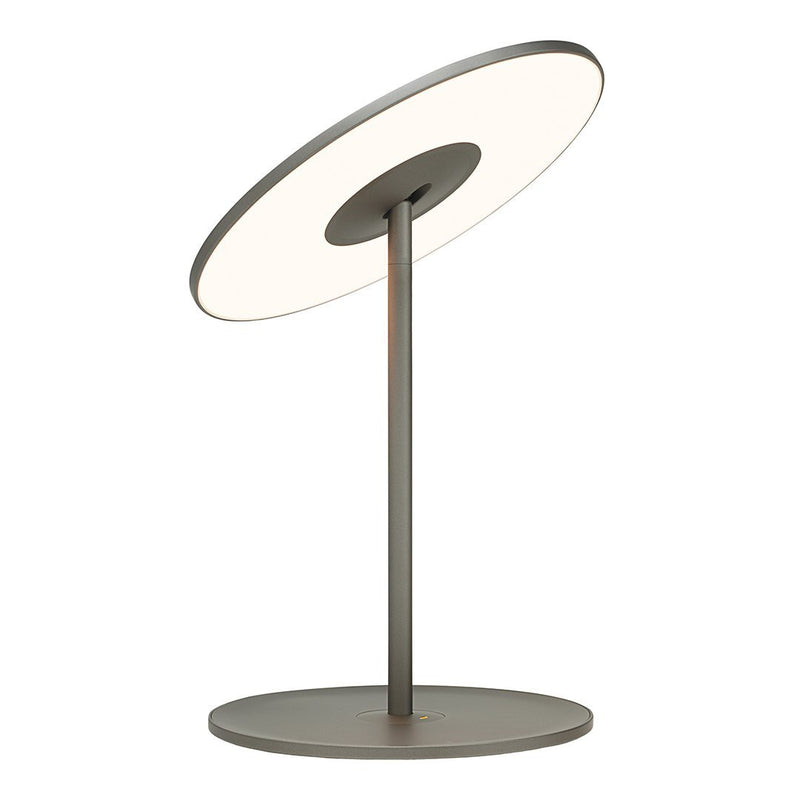 Modern table lamp with a circular white shade and a sleek metallic gray base, ideal for contemporary decor.