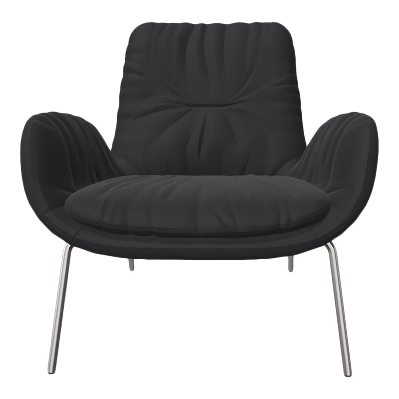 Black plush armchair with unique tufted pattern and sleek metallic legs, perfect for modern decor.