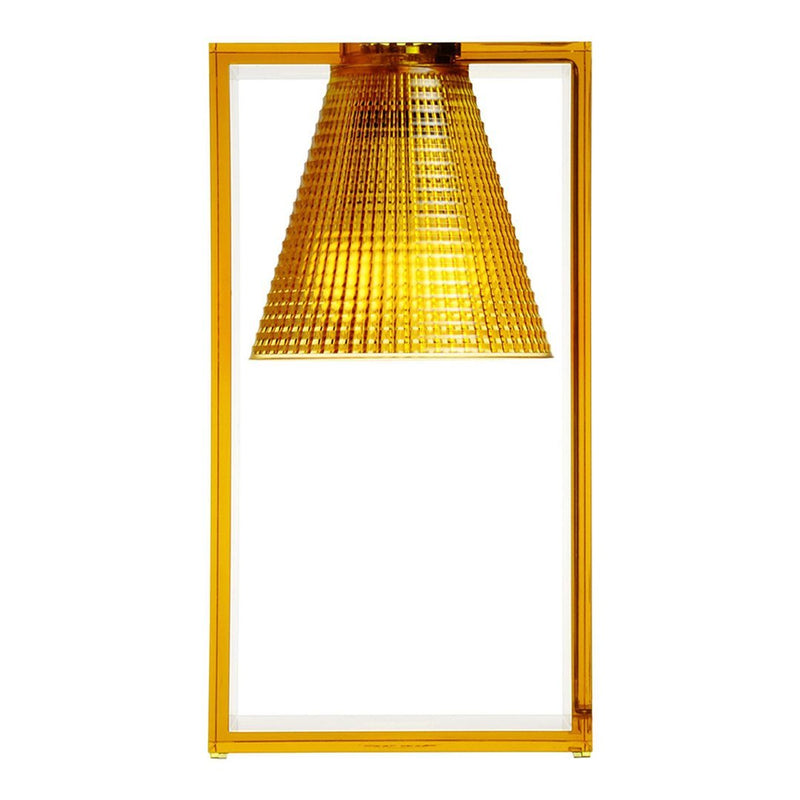 Yellow geometric-patterned lamp with a textured shade and sleek geometric frame. Perfect for modern decor.
