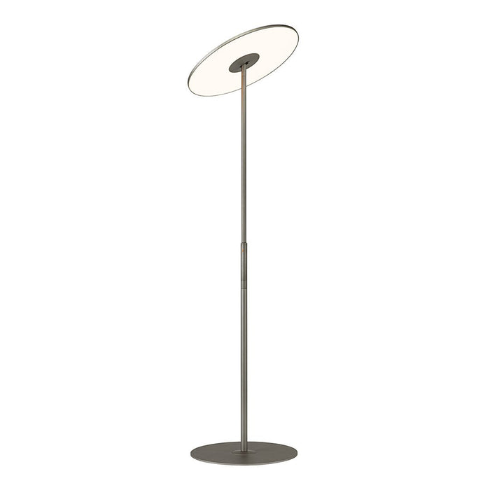 Sleek metallic floor lamp with a round white shade and smooth, minimalist design. Ideal for modern decor.