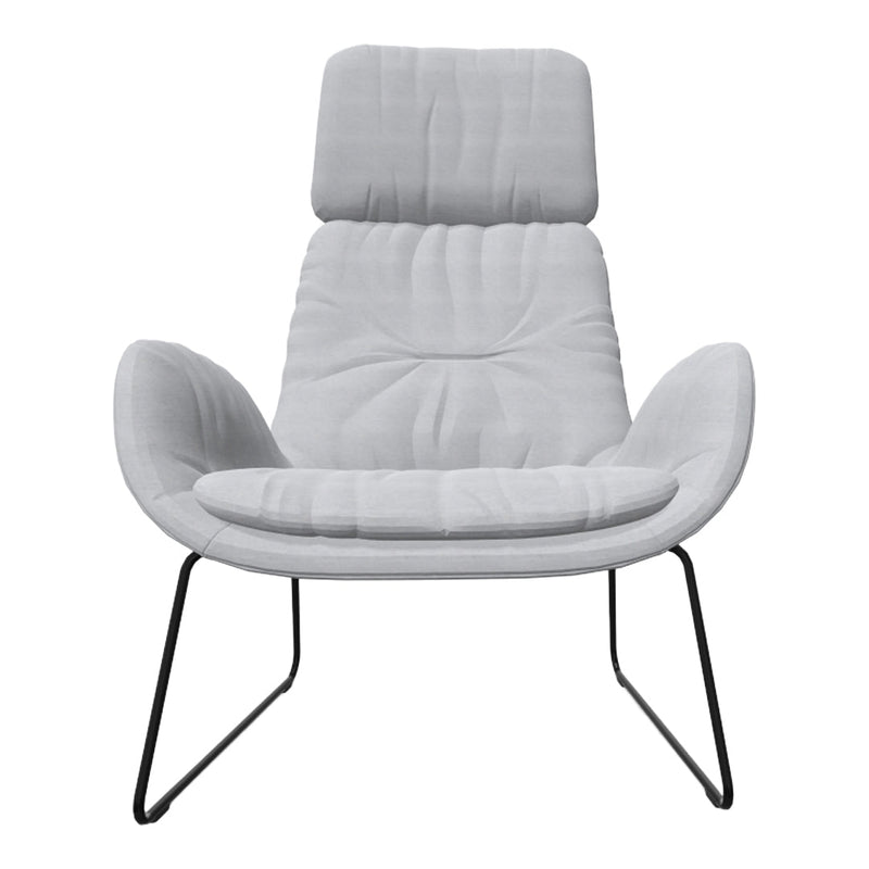 Light gray upholstered chair with soft, tufted fabric and sleek black metal legs. Modern minimalist design.