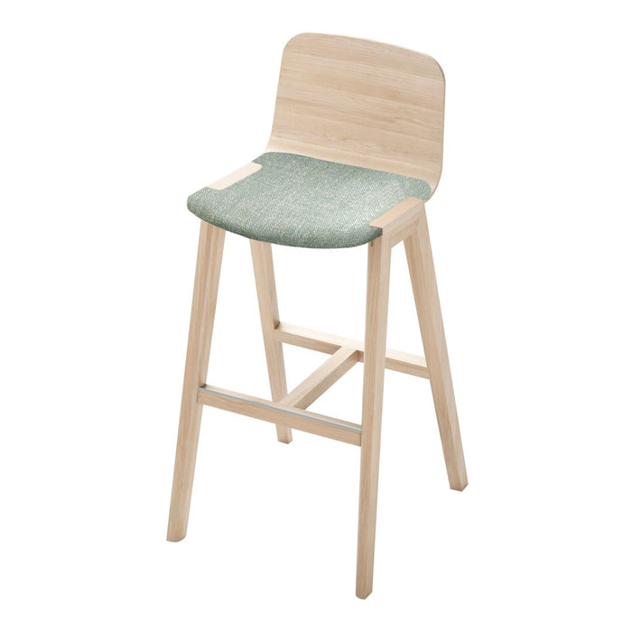 Light wood bar stool with a textured, soft mint green seat and a minimalistic design. Perfect for modern interiors.