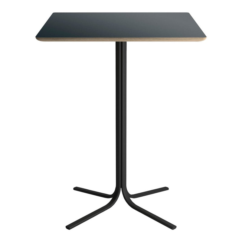 Black tabletop with light wood edge and sleek black base, featuring a modern minimalistic design.