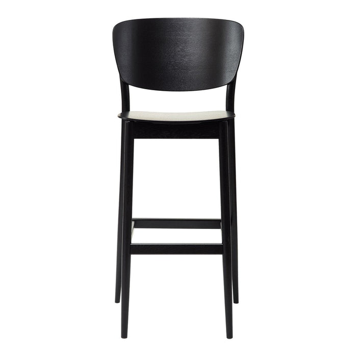 Stylish black wire chairs with geometric patterns casting shadows on a light gray surface. Modern outdoor furniture design.
