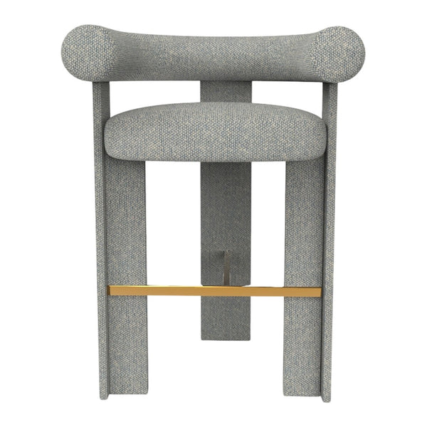 Gray upholstered bar stool with soft curves and a natural wood accent strip. Modern, minimalist design.