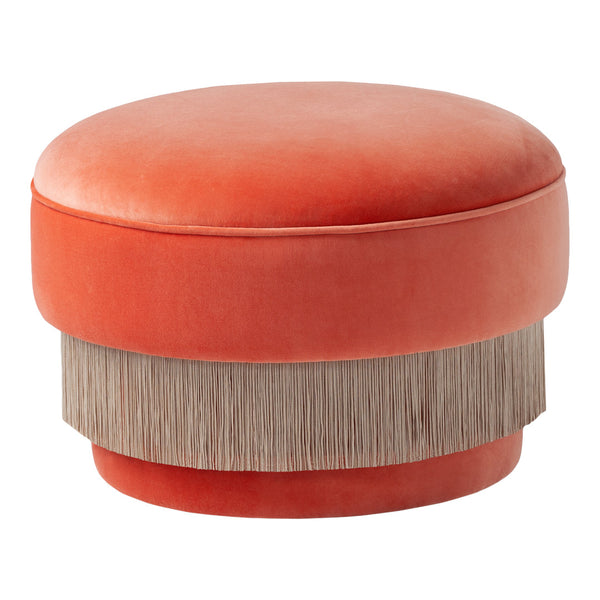 Orange velvet round ottoman with a textured fringe in a neutral beige. Chic and modern home decor accent.