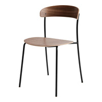 "Stylish chair with a warm wood seat and backrest, paired with sleek black metal legs for a modern look."