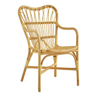 Natural rattan armchair with a warm beige color and intricate woven pattern, perfect for a boho-chic decor.