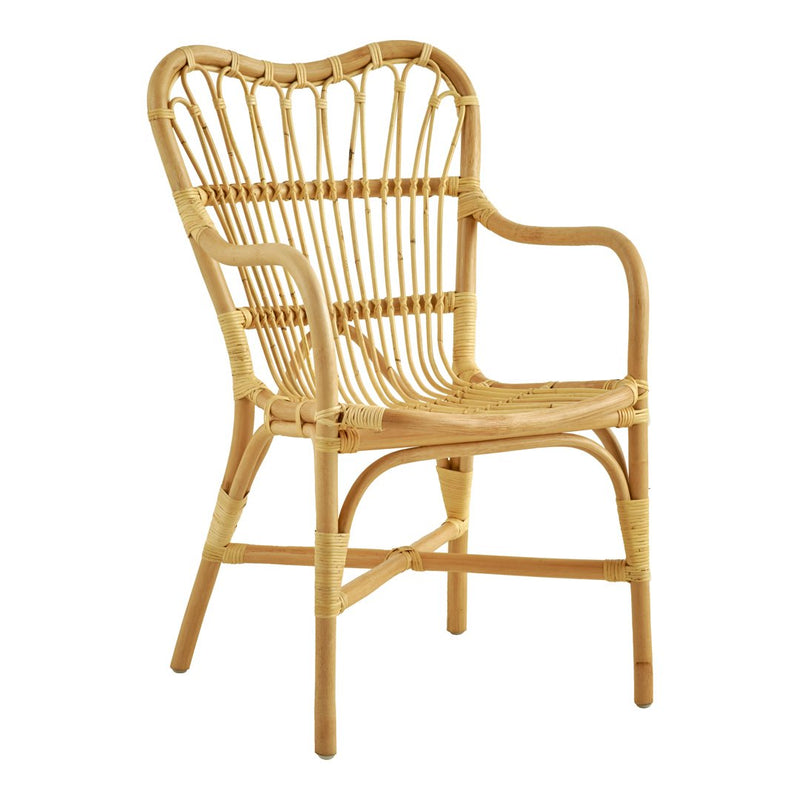 Natural rattan armchair with a warm beige color and intricate woven pattern, perfect for a boho-chic decor.