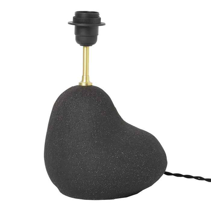 Black textured lamp base with a smooth, rounded shape and gold metal socket. Stylish design with modern aesthetic.