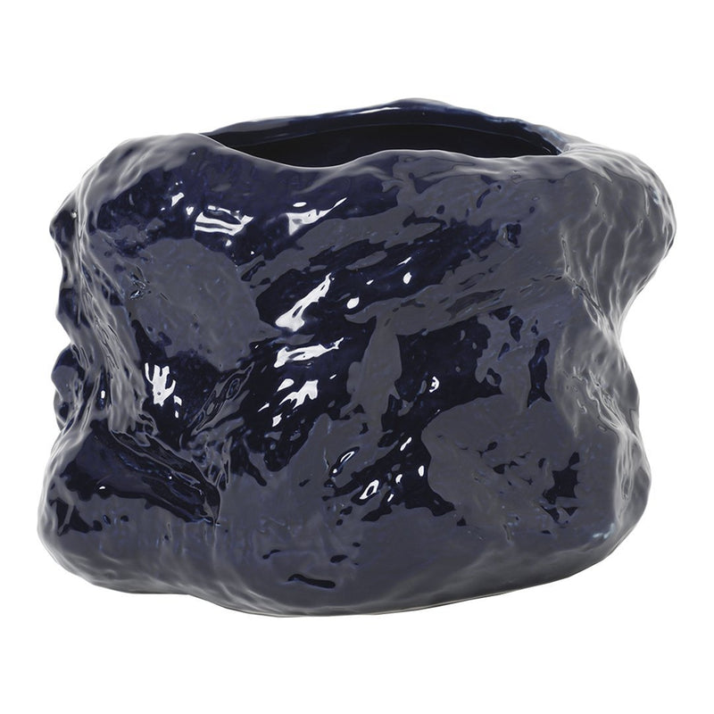 Glossy navy blue ceramic vase with an organic, textured surface for a modern, artistic touch.