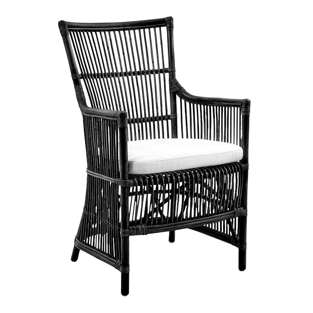 Black woven rattan chair with a white cushion, featuring a stylish slatted pattern for a modern look.