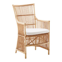 Natural bamboo chair with a white cushion, featuring a sleek, woven pattern and a minimalist design.