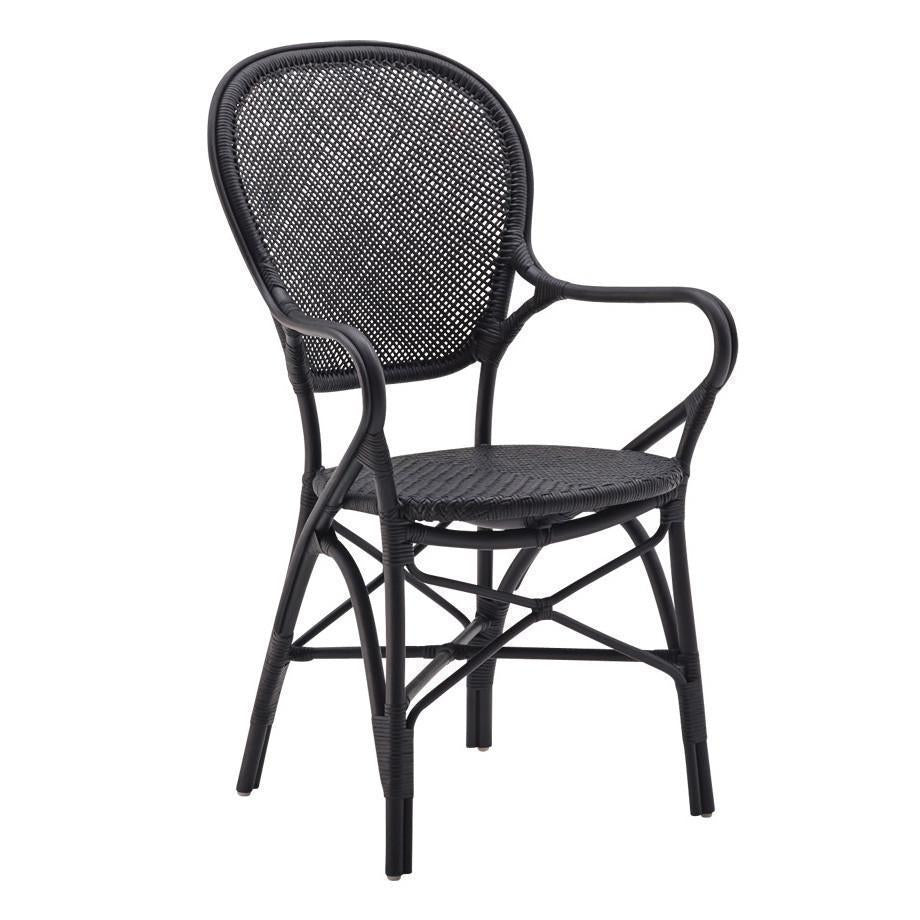 Black rattan chair with a woven pattern, featuring curved armrests and a classic silhouette. Perfect for stylish seating.