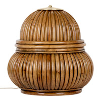 Brown wooden lamp with a ribbed texture, showcasing a sleek, rounded design. Elegant and modern home decor accent.