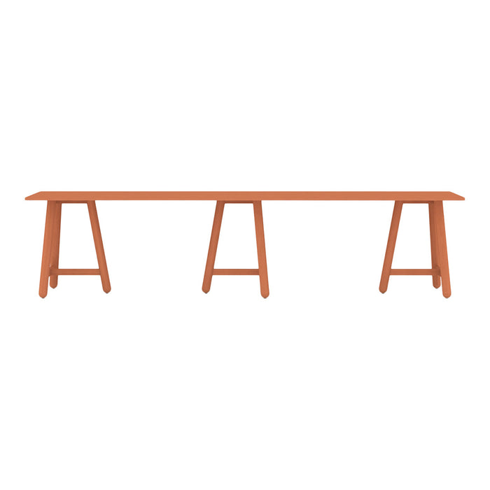 Rust-orange wooden table with a sleek, minimalist design and simple leg pattern, perfect for modern decor.